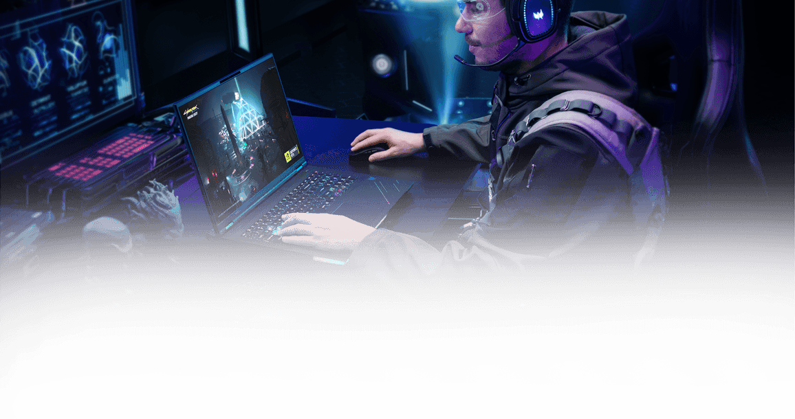 Gracz przy laptopie Predator