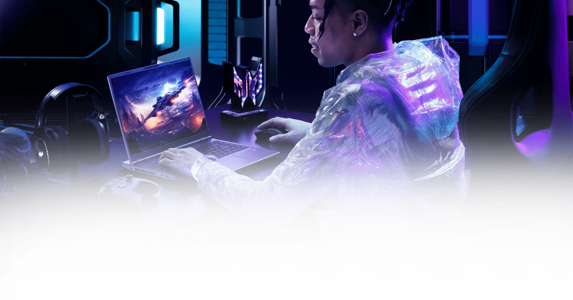 Gracz przy laptopie Predator