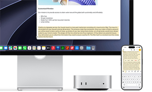 Widok z przodu na Maca mini schowanego pod monitorem Studio Display, po prawej stronie urządzenia i monitora znajduje się iPhone; na iPhonie widać zaznaczony tekst z poleceniami wcięcia, kopiowania, wklejania i automatycznego wstawiania powyżej, który odpowiada wyróżnionemu tekstowi na wyświetlaczu, co demonstruje działanie Uniwersalnego schowka