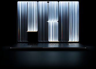 MacBook Pro z wyświetlaczem PROLED XDR, kolor gwiezdnej czerni, na ekranie widać obiekty przypominające wstążki gęsto pokryte świecącymi pasami, które układają się w słowo Pro