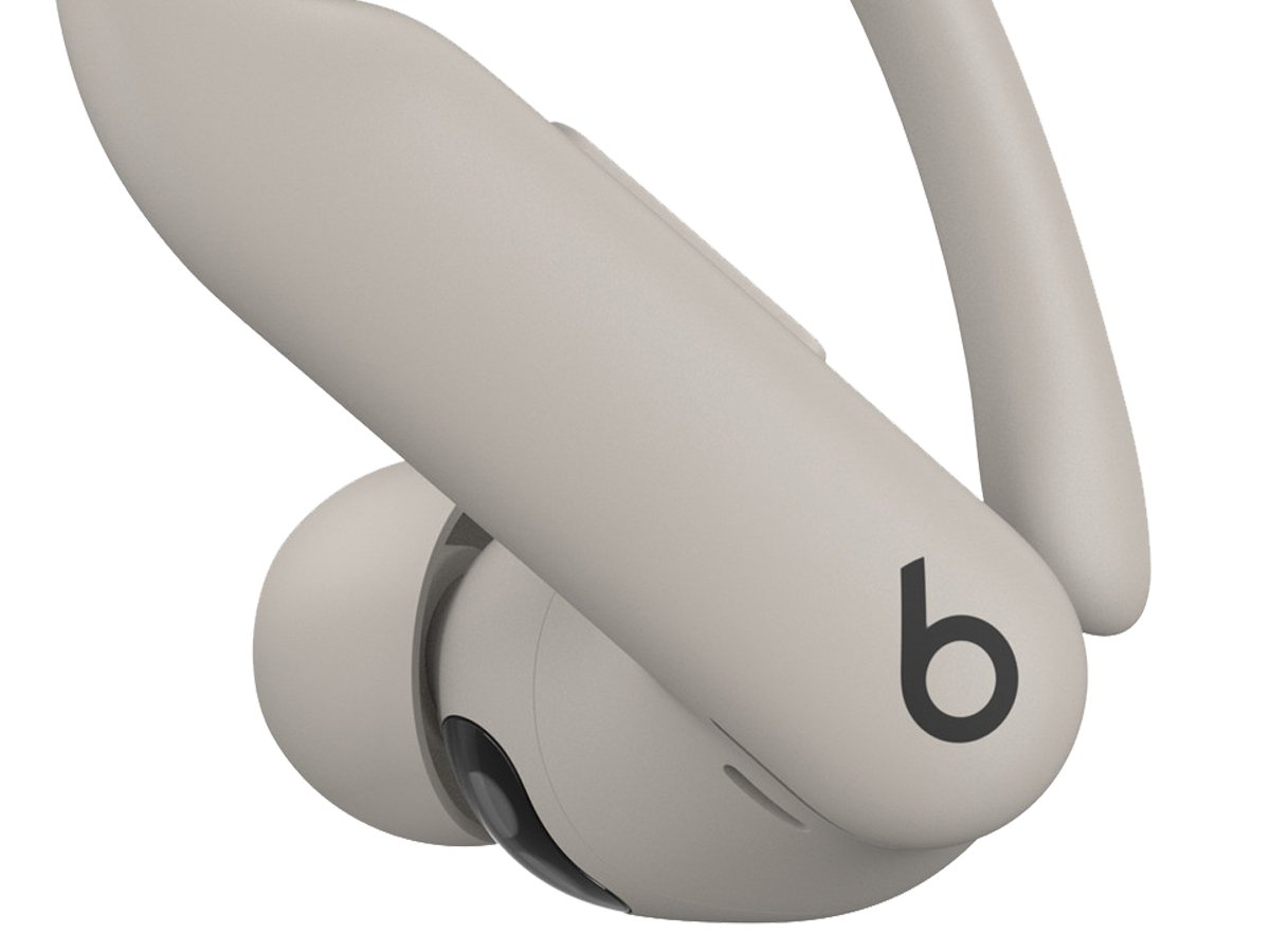 Słuchawki Apple Powerbeats Pro 2 Piaskowa burza - Zbliżenie lewej słuchawki