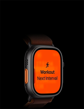 Apple Watch Ultra 4 z kopertą z tytanu w kolorze czarnym, widać kolejny interwał treningu Bieg, widoczny lewy bok urządzenia, przycisk czynności w kolorze pomarańczowym, opaska Alpine