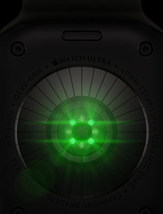 Tył Apple Watch Ultra 4, koperta z tytanu w kolorze czarnym z wieloma okrągłymi czujnikami i poświatą zielonych diod LED