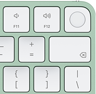 Klawiatura Magic Keyboard, prawy górny róg, kolor zielony, czytnik Touch ID, klawisz Delete i&nbsp;klawisze regulacji głośności