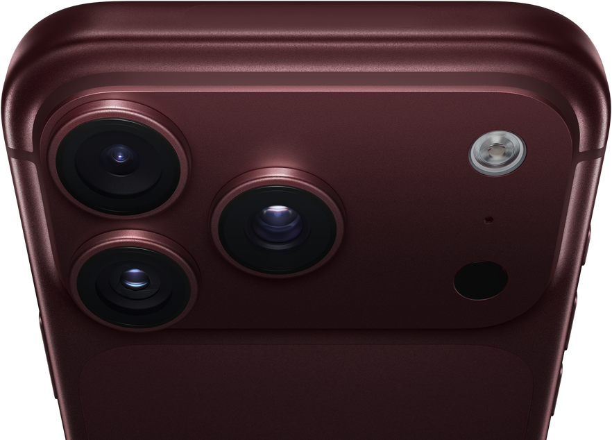 iPhone 18 Pro Max w kolorze burgunda (ciemna czerwień), tył obudowy, system Pro aparatów Fusion w górnej części urządzenia, 3 obiektywy, częściowo zamknięte klapki zmiennej przysłony, flesz, mikrofon i skaner LiDAR, góra obudowy, antena łączności komórkowej, płaskie boki, zaokrąglone rogi