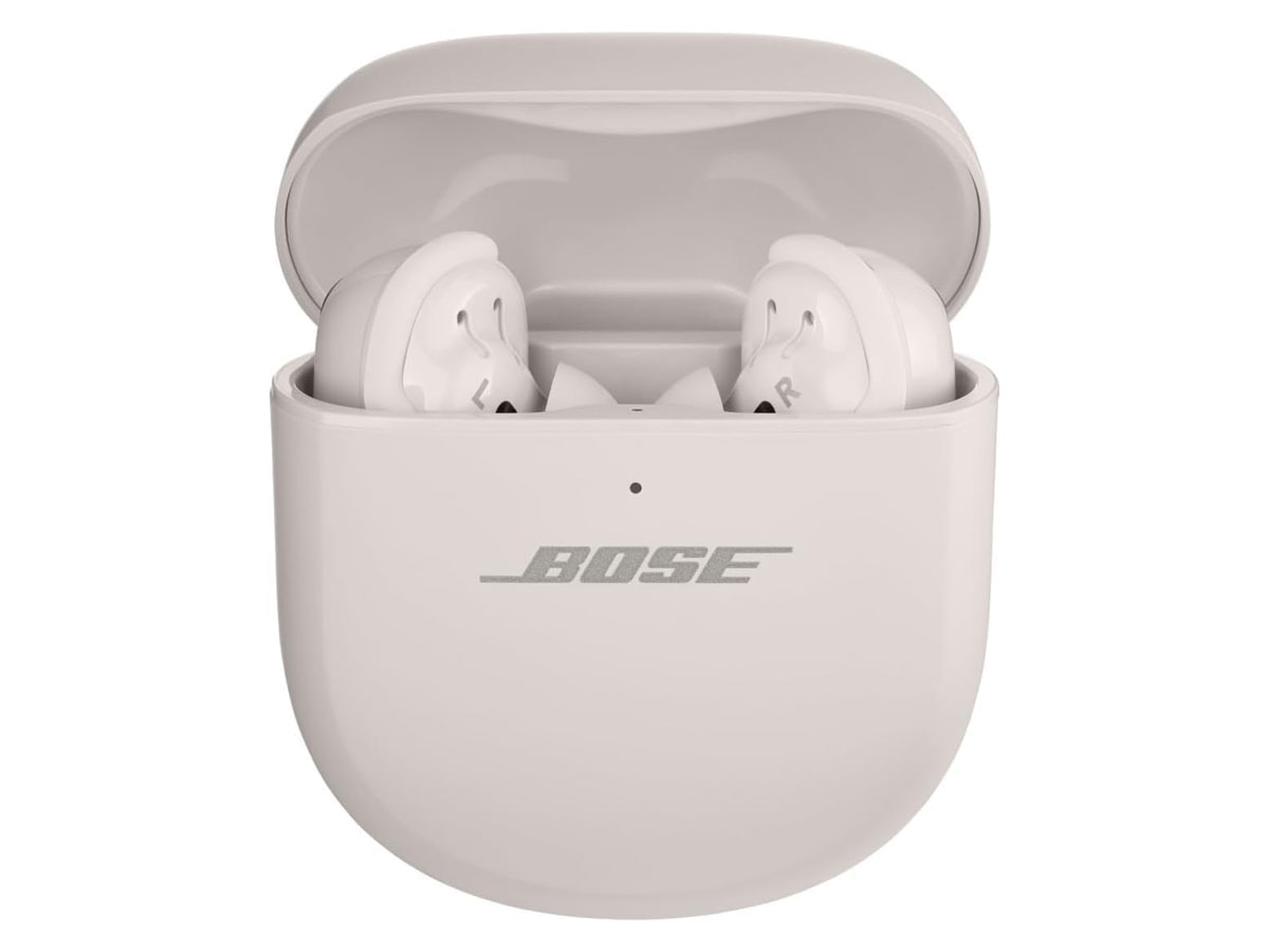 Słuchawki bezprzewodowe Bose QuietComfort Ultra Earbuds Białe - Widok od przodu wraz z otwartym etui ładującym
