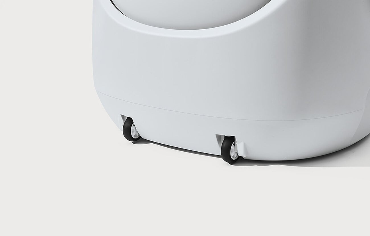 Zbliżenie na podwójne kółka w podstawie kuwety CATLINK BayMax Lite