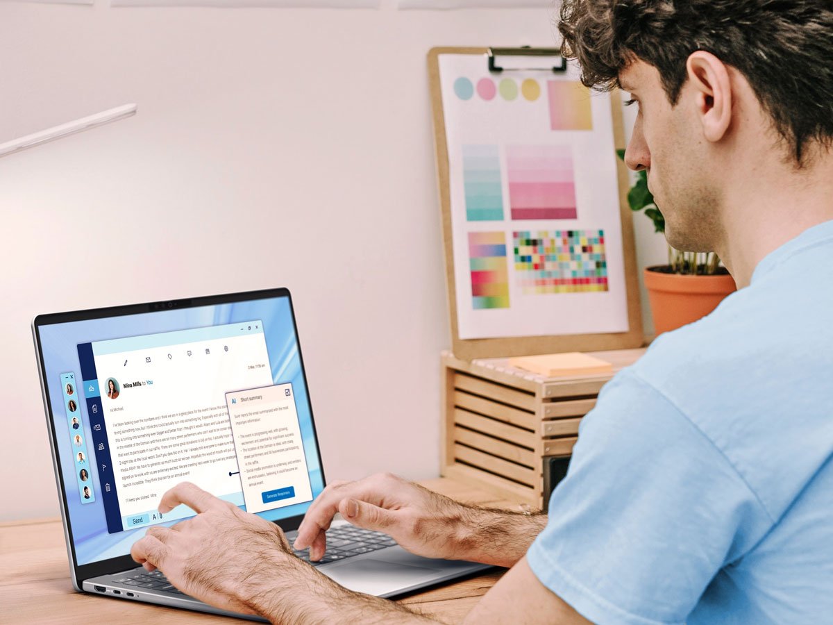 Mężczyzna w trakcie pisania wiadomości na Laptopie Dell 16 Plus