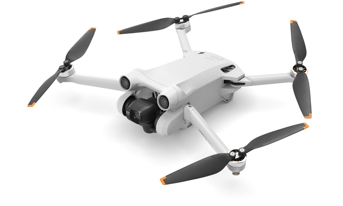 Dron DJI Mini 3 Pro - Widok przodu i lewego boku pod kątem