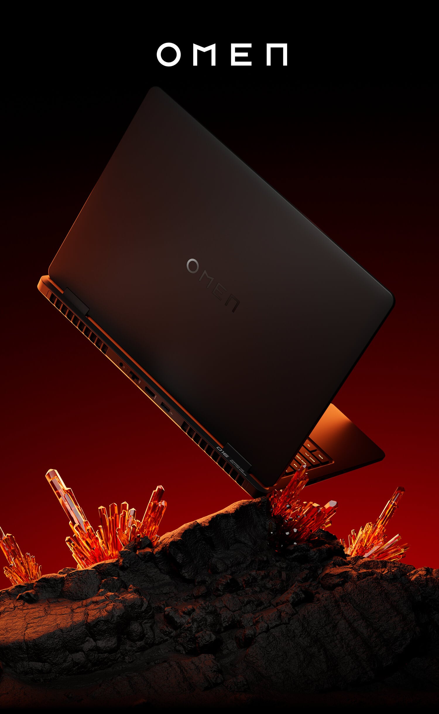 Tył obudowy laptopa gamingowego HP OMEN 16 na tle czarnych skał i czerwonych kryształów