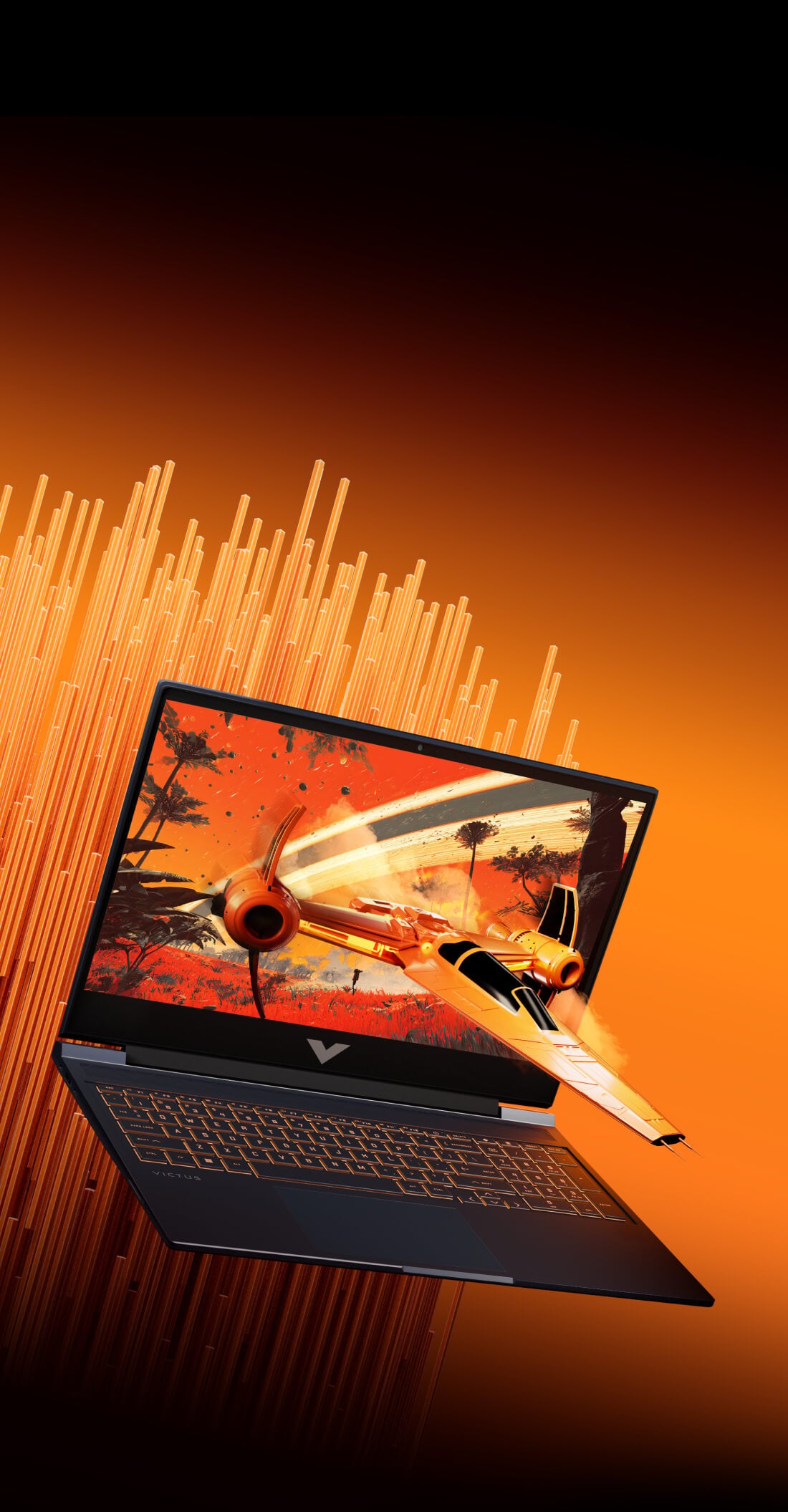 Laptop HP Victus z dynamiczną sceną gry wylatującą z ekranu
