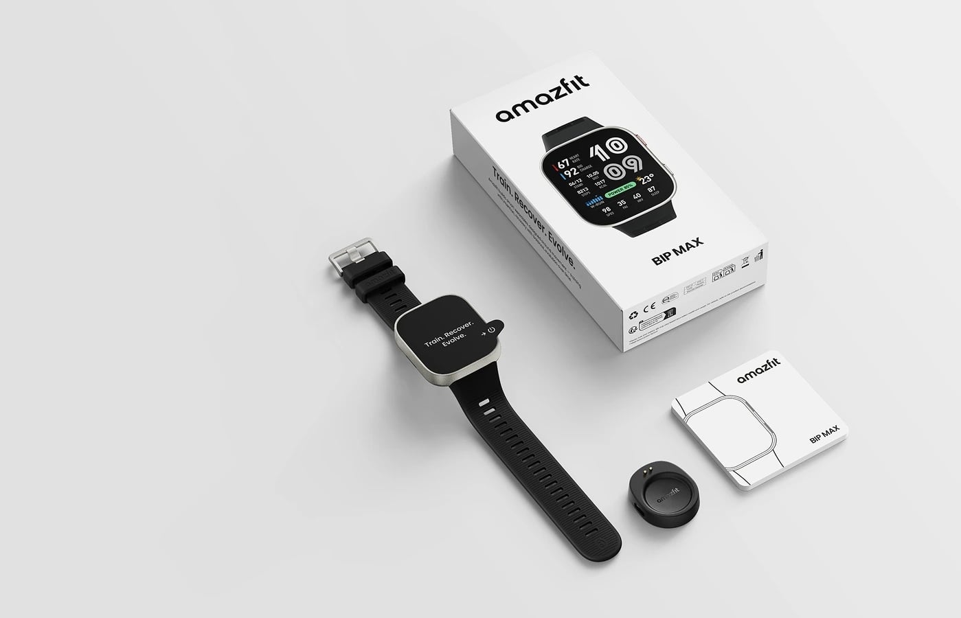 Smartwatch Amazfit Bip Max obok oryginalnego opakowania, instrukcji i ładowarki na jasnym tle.