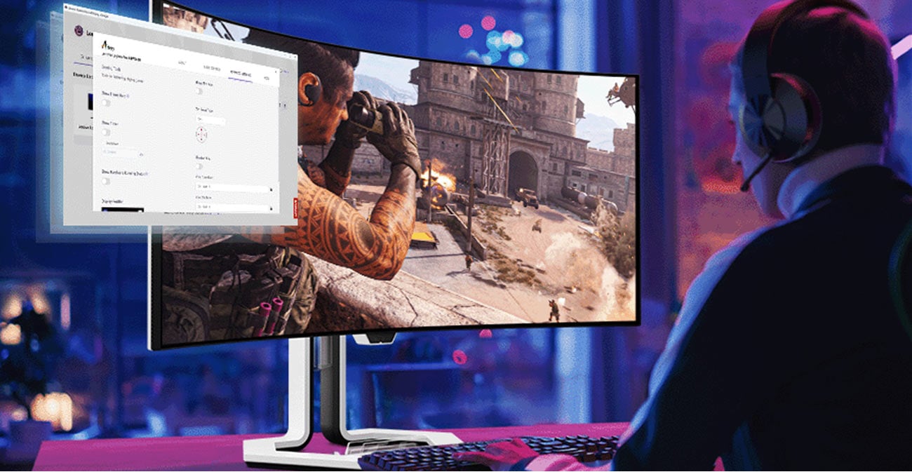 Monitor Lenovo Legion Pro 34WD-10 na biurku przed którym siedzi młoda osoba i gra w grę komputerową