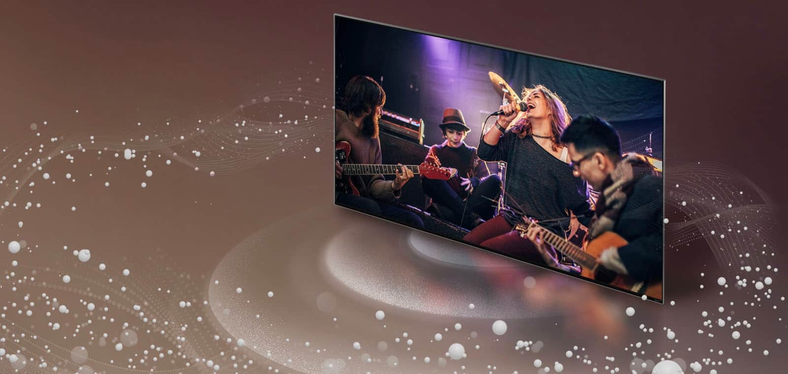 LG TV emituje z ekranu bąbelki i fale dźwiękowe, które wypełniają przestrzeń.