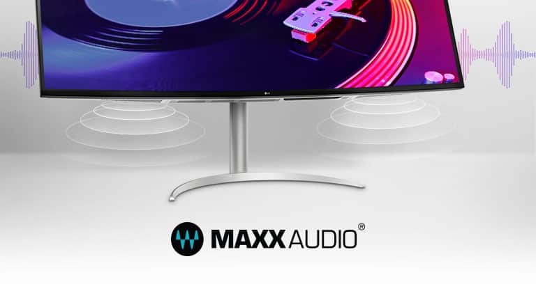 Pokazuje dwa głośniki stereo o mocy 10 W i napis MaxxAudio® na dole monitora.