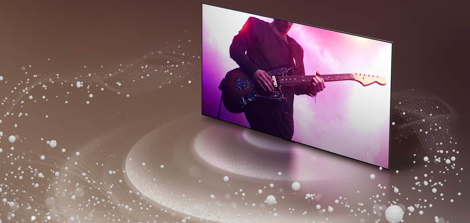 LG OLED TV emituje z ekranu bąbelki i fale dźwiękowe, które wypełniają przestrzeń.