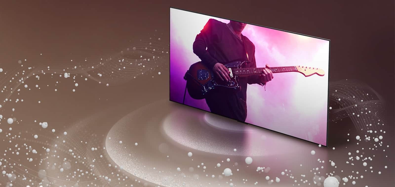 LG OLED TV emituje z ekranu bąbelki i fale dźwiękowe, które wypełniają przestrzeń.