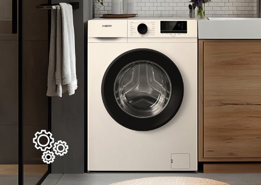 Pralka automatyczna MPM-5712-PK-45 w nowoczesnej łazience, obok szafka z umywalką.