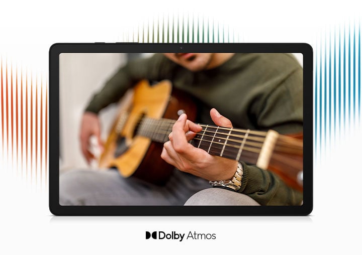 Galaxy Tab A9 Plus można zobaczyć z osobą grającą na gitarze na ekranie. Za urządzeniem znajduje się grafika ilustrująca fale dźwiękowe. Pod urządzeniem znajduje się nazwa marki Dolby Atmos. Galaxy Tab A9 Plus można zobaczyć z osobą grającą na gitarze na ekranie. Za urządzeniem znajduje się grafika ilustrująca fale dźwiękowe. Pod urządzeniem znajduje się nazwa marki Dolby Atmos.
