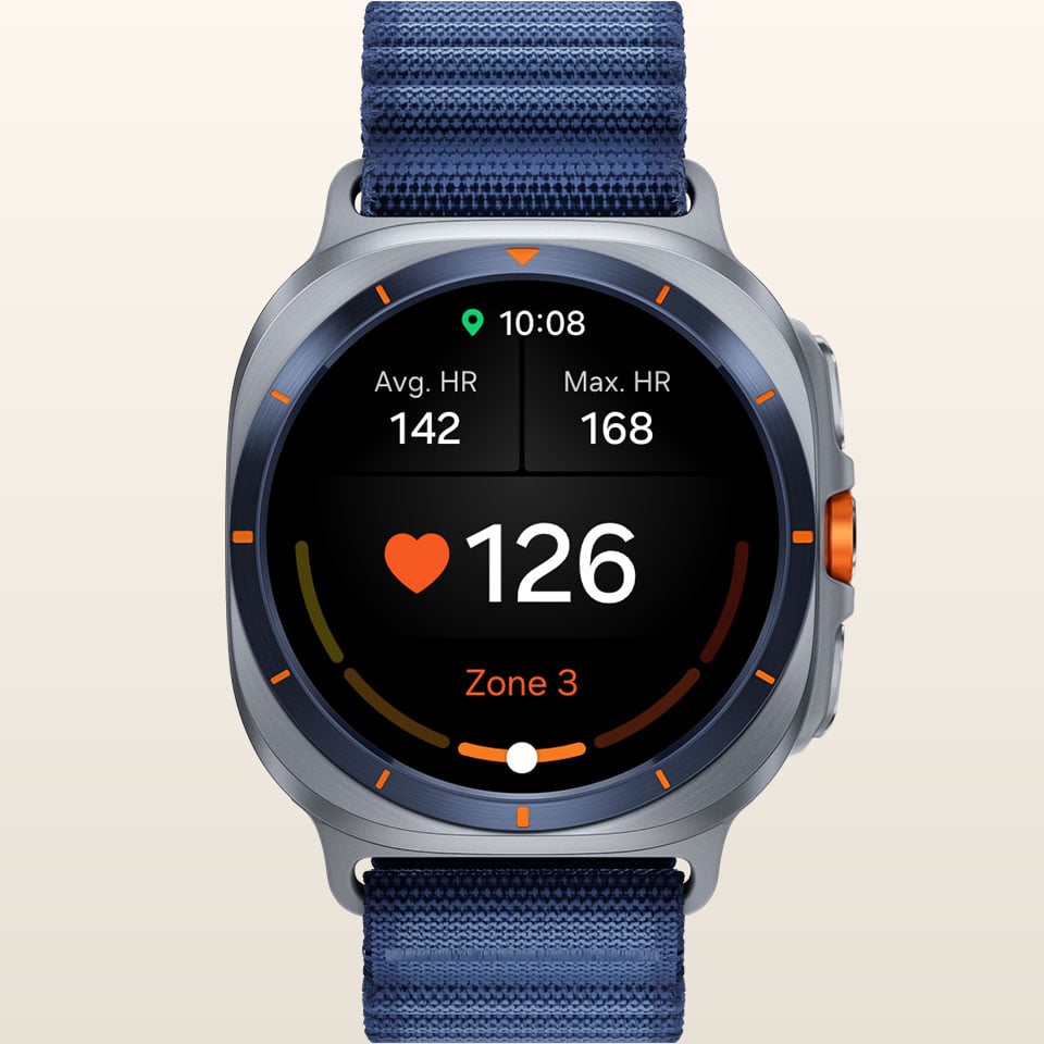 Galaxy Watch Ultra wyświetla ekran spersonalizowanej strefy tętna, pokazujący średnie tętno, maksymalne tętno, aktualne tętno i aktualną strefę tętna. Galaxy Watch Ultra wyświetla ekran spersonalizowanej strefy tętna, pokazujący średnie tętno, maksymalne tętno, aktualne tętno i aktualną strefę tętna.