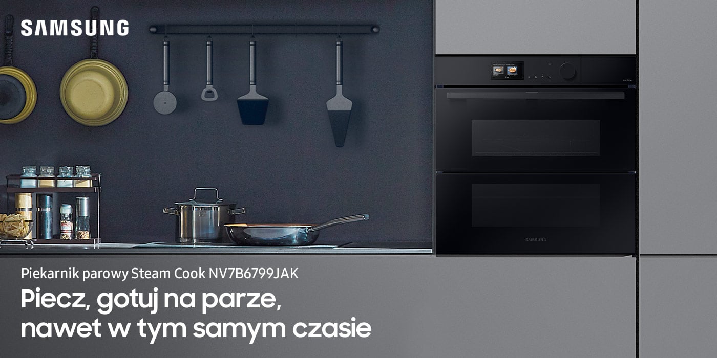 Zdjęcie z szarą zabudową, w którą wstawiony został piekarnik Samsung Steam Cook NV7B6799JAK z oferty sieci Neonet