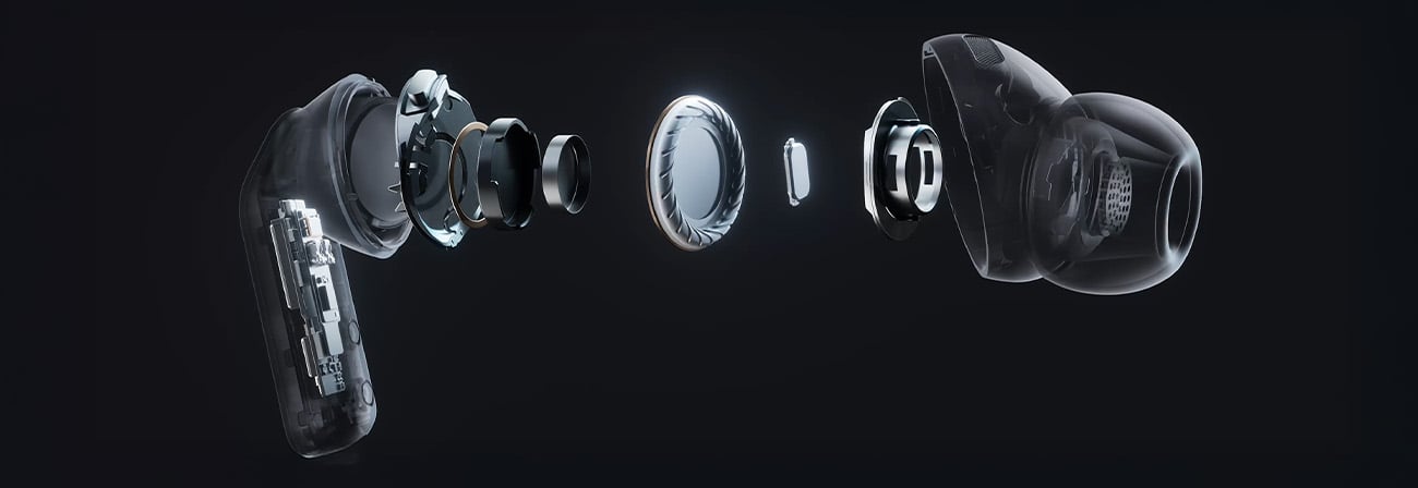 Widok budowy wewnętrznej pojedynczej słuchawki Galaxy Buds4Pro, pokazujący części słuchawki, w tym głośnik niskotonowy.