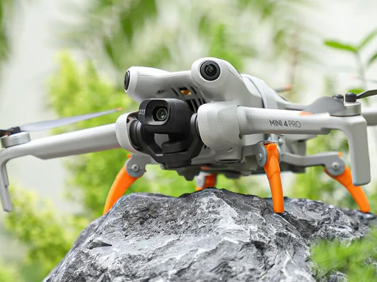 Podwyższenie podwozia Sunnylife do DJI Mini 4 Pro Pomarańczowe - Grafika lifestyle