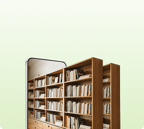 Narożnik smartfona wyświetlający regały pełne książek usytuowane obok fizycznych regałów bibliotecznych