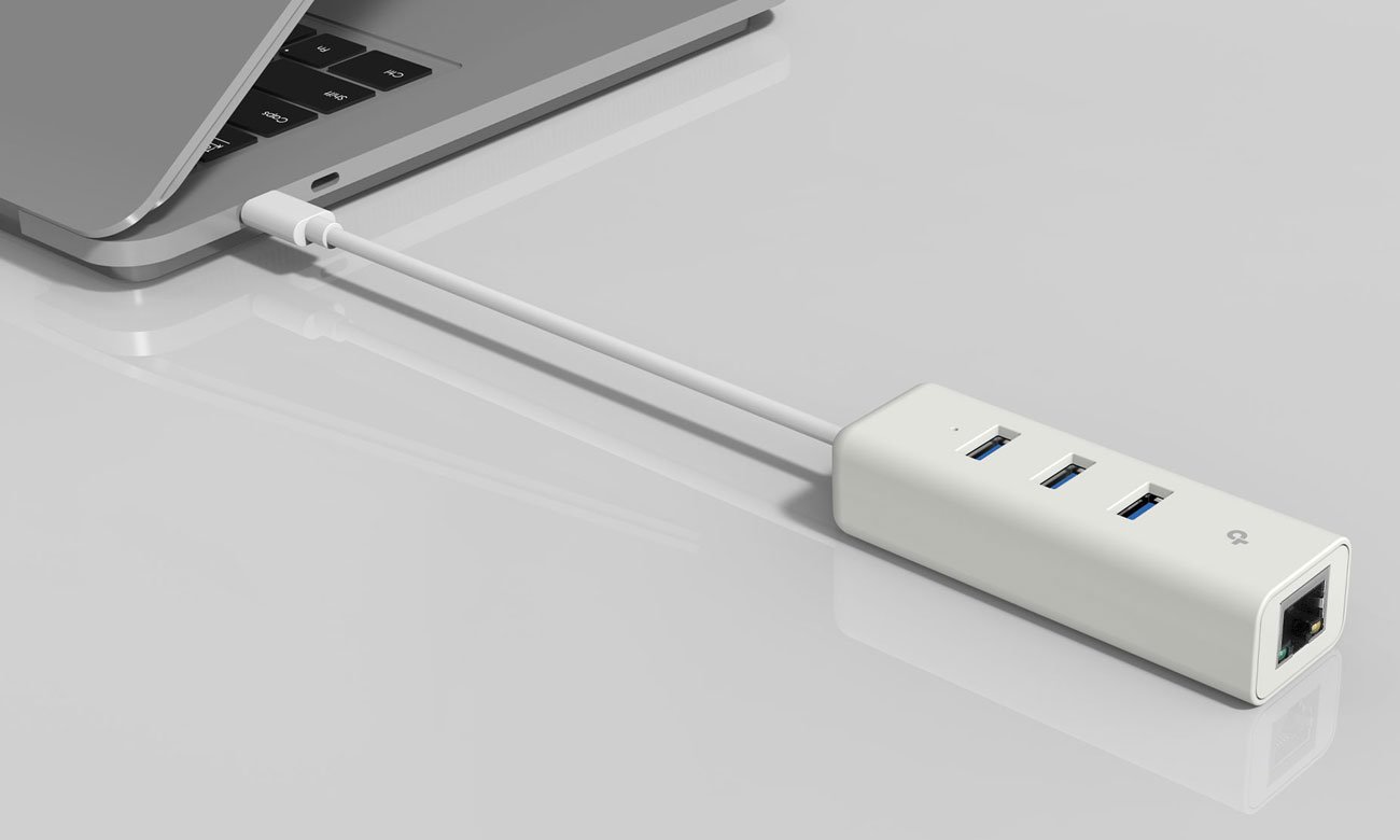 Karta sieciowa TP-Link UE330 (10/100/1000Mbit) USB 3.0 Typ C + HUB 3x USB 3.0 - Grafika lifestyle
